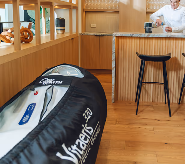 Modern kitchen with a hyperbaric chamber in the foreground
